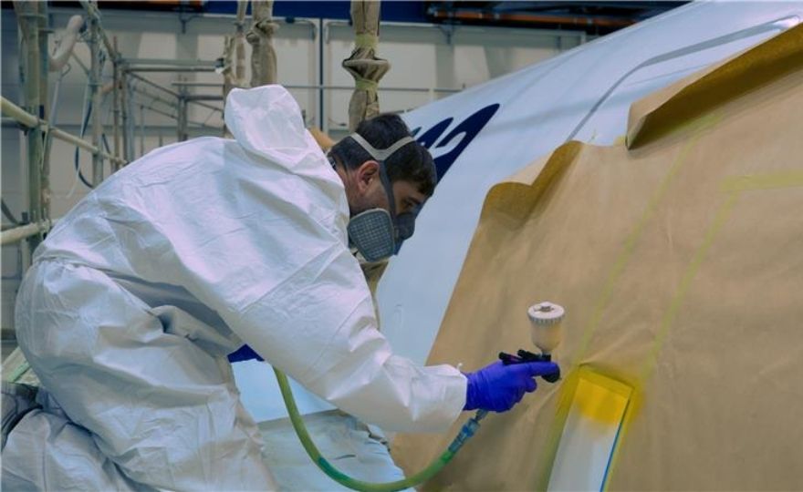 Airbourne Colours - Employee Paint spraying