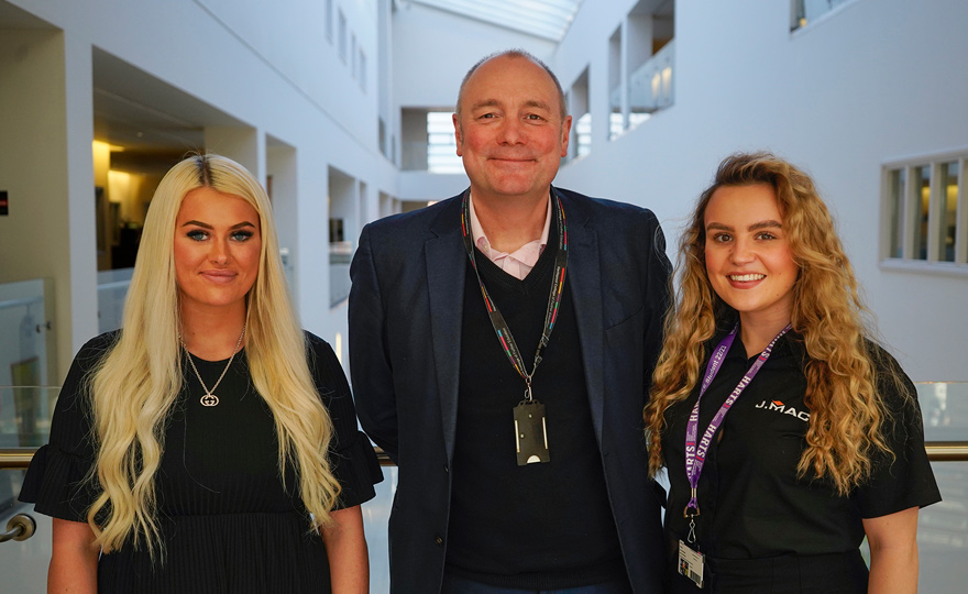 Niamh Hume and JMAC Group's Elle Payne with Hartlepool College of Further Education Principal Darren Hankey. Picture: HCFE