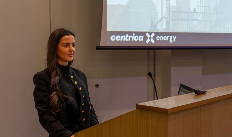 Aysha presenting a Net Zero Safety Talk at a Lecturn