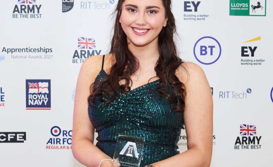 Eden picking up her award at the National Awards Evening