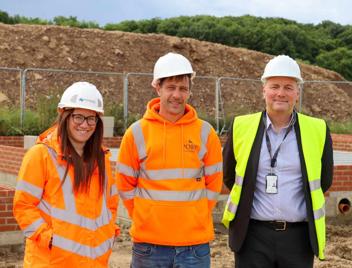 Pictured Left to Right; Seymour's Training Academy Manager Donna King with the 400th learner into work, Chris Harland, and Hartlepool College of Further Education Principal Darren Hankey at PORT Homes' Seaton Meadows site. Picture: Seymour