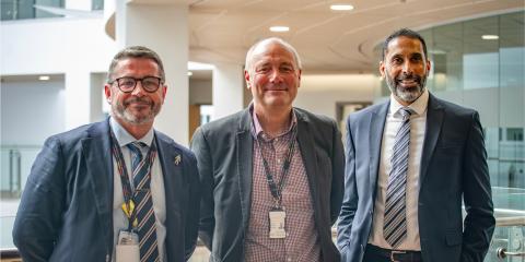 Stuart Irvine, Darren Hankey and incoming Chair of Governors Haani Hasnain stand together at Hartlepool College.
