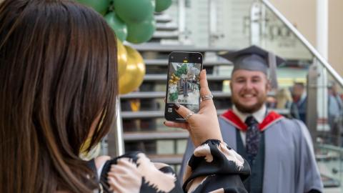 Graduation Mobile Photo Taking and Graduate