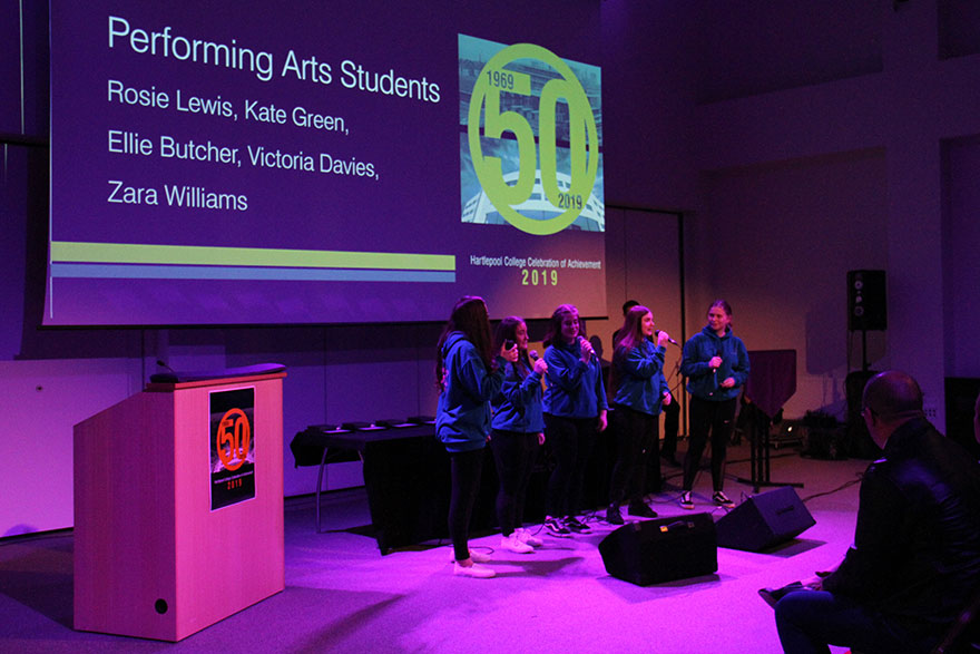 Performing Arts Students singing at Celebration of Acheivement 2019